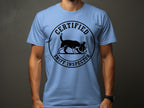Light blue t-shirt with "Certified Sniff Inspector" text and dog graphic.
