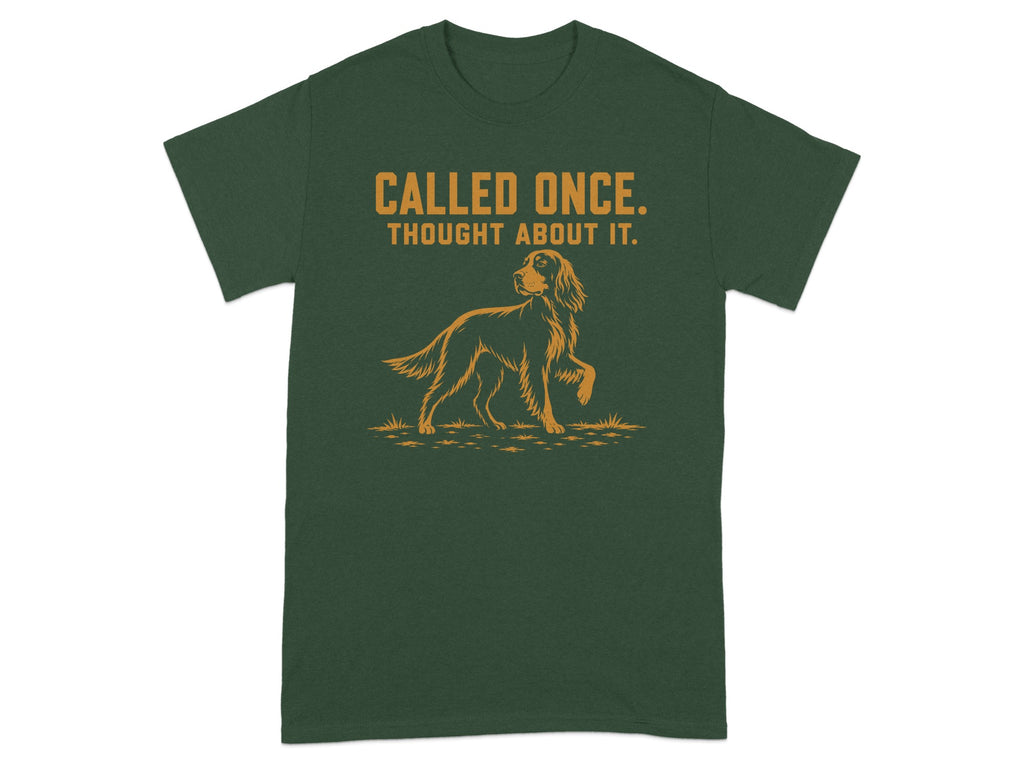 Green t-shirt with text "CALLED ONCE. THOUGHT ABOUT IT." and dog graphic.