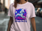 Pink t-shirt with watercolor poodle art and text "Unleash the Joy".