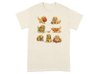 Six golden retriever puppies interact with yarn, knitting needles, and baskets on a cream t-shirt.