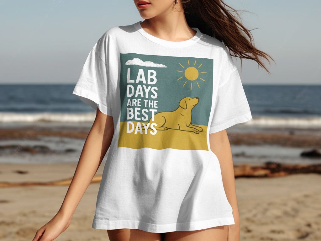 White t-shirt with graphic of a yellow lab, sun, and text "Lab days are the best days."