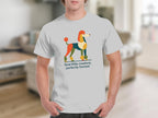 White t-shirt with a geometric poodle graphic and text "feral little creature, perfectly formed."