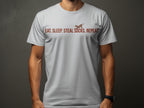 White t-shirt with "EAT. SLEEP. STEAL. SOCKS. REPEAT." and dog graphic.