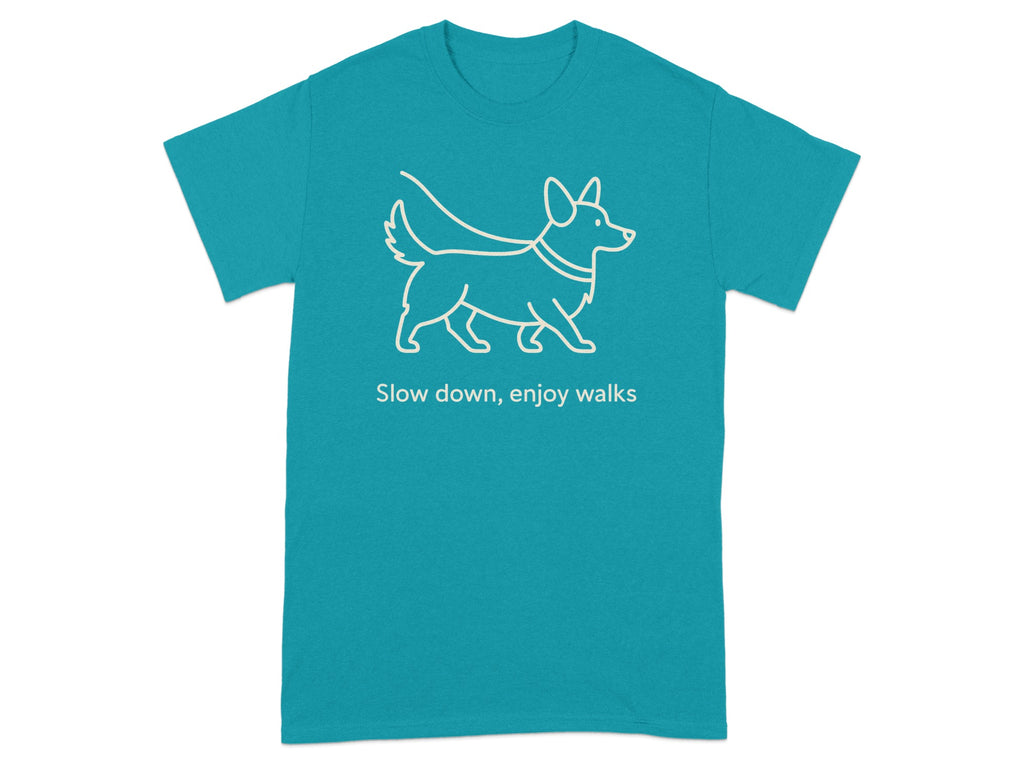 Turquoise t-shirt with white line art of a corgi and text "Slow down, enjoy walks".