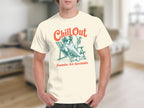 Cream t-shirt with dog wearing sunglasses relaxing in a beach chair.