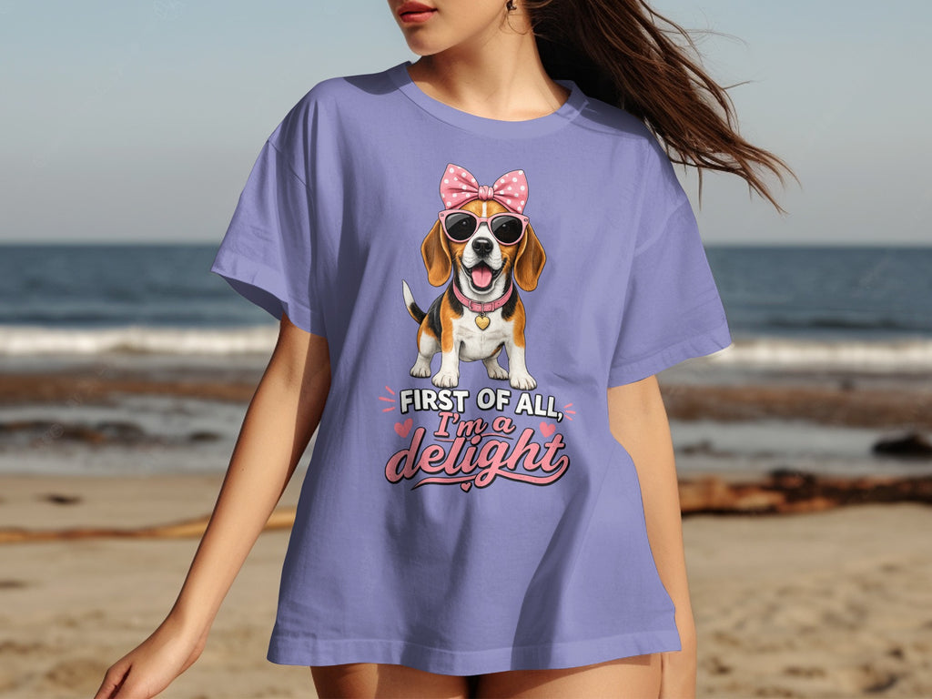 Purple t-shirt with beagle wearing sunglasses and bow, "First of all, I'm a delight".