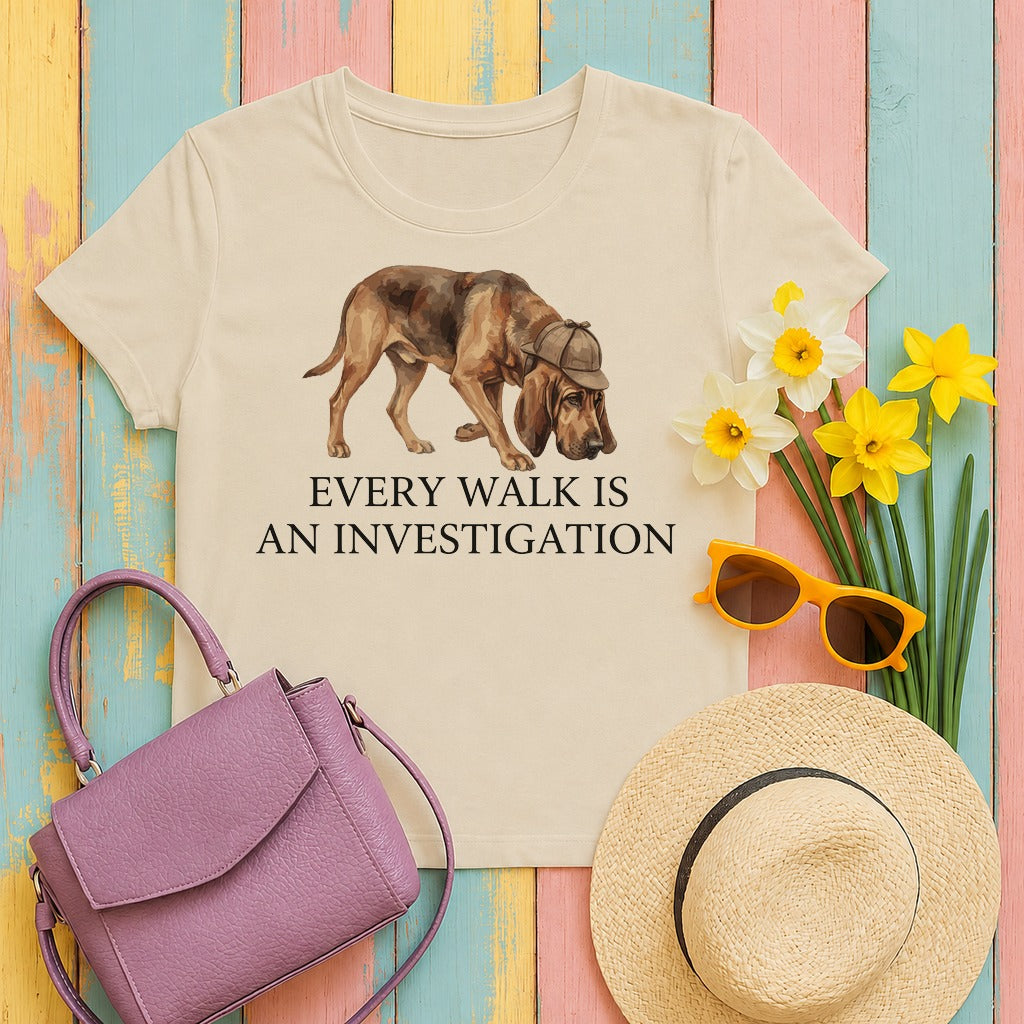 mig2 every-walk-is-an-investigation-bloodhoun tee flat lay hero v8