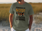 Green t-shirt with beagle graphic and text "POWERED BY NOSE & SELECTIVE HEARING".