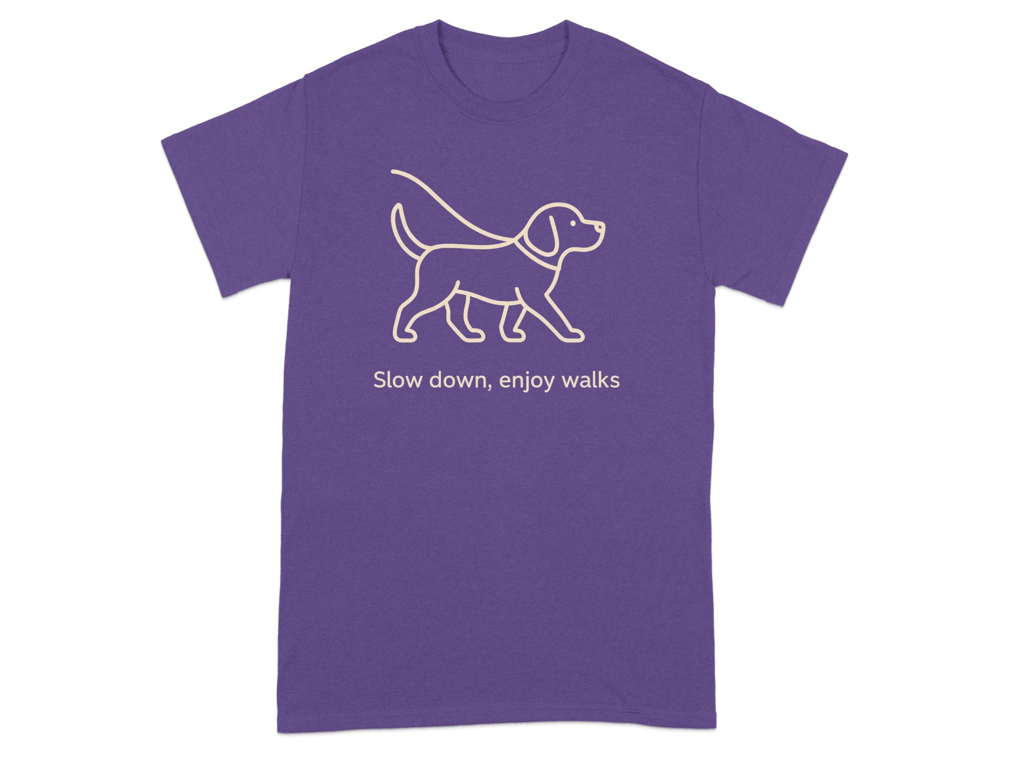 Purple t-shirt with a line drawing of a dog on a leash and the text "Slow down, enjoy walks".