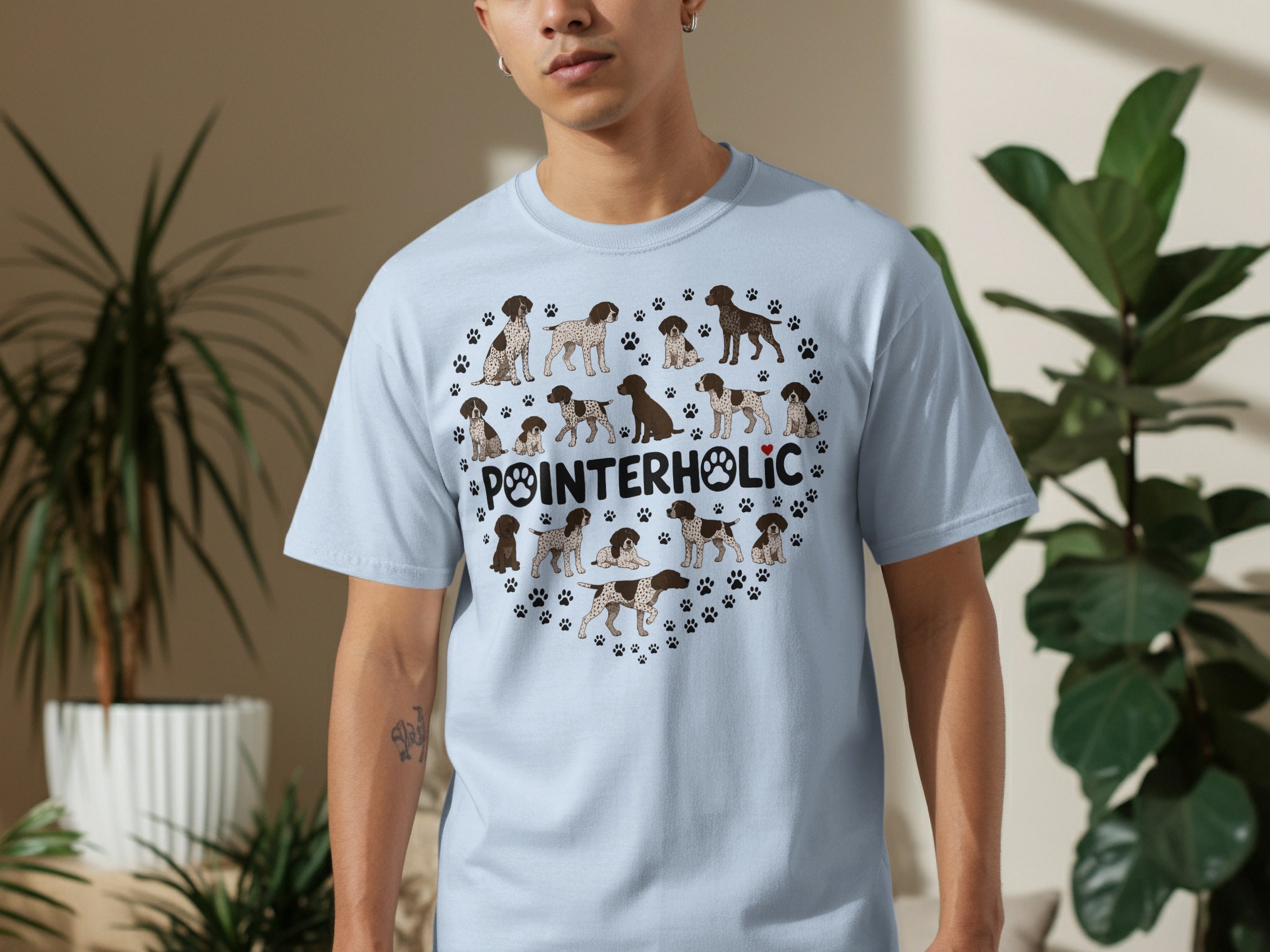 Light blue t-shirt with heart shape of German Shorthaired Pointers and paw prints.