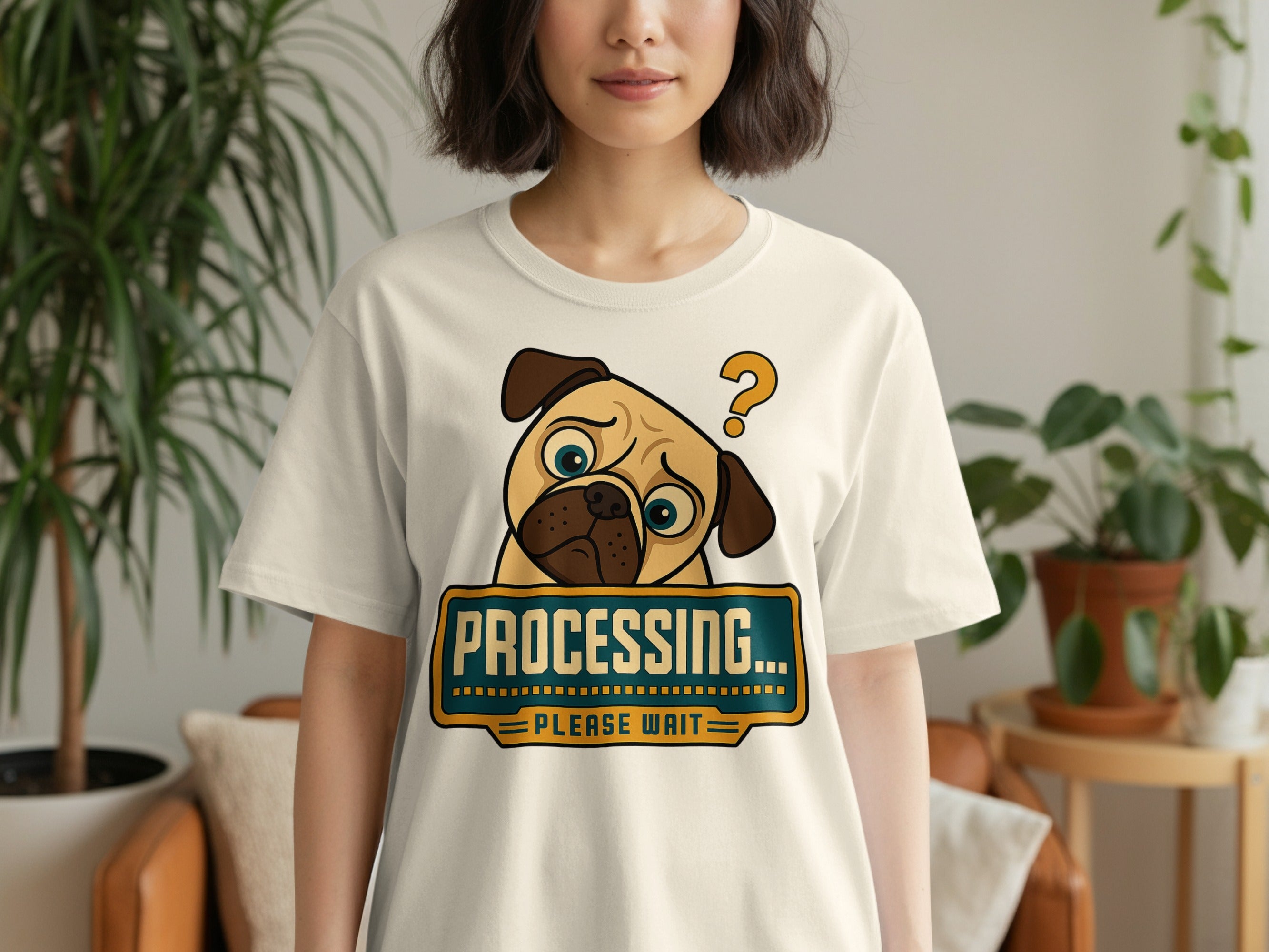 Cream t-shirt with pug graphic and text "PROCESSING... PLEASE WAIT".