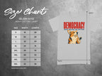 Gildan 5000 t-shirt size chart with "Democracy Was Never an Option" graphic.