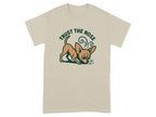 T-shirt with a cartoon chihuahua sniffing the ground and text "TRUST THE NOSE".