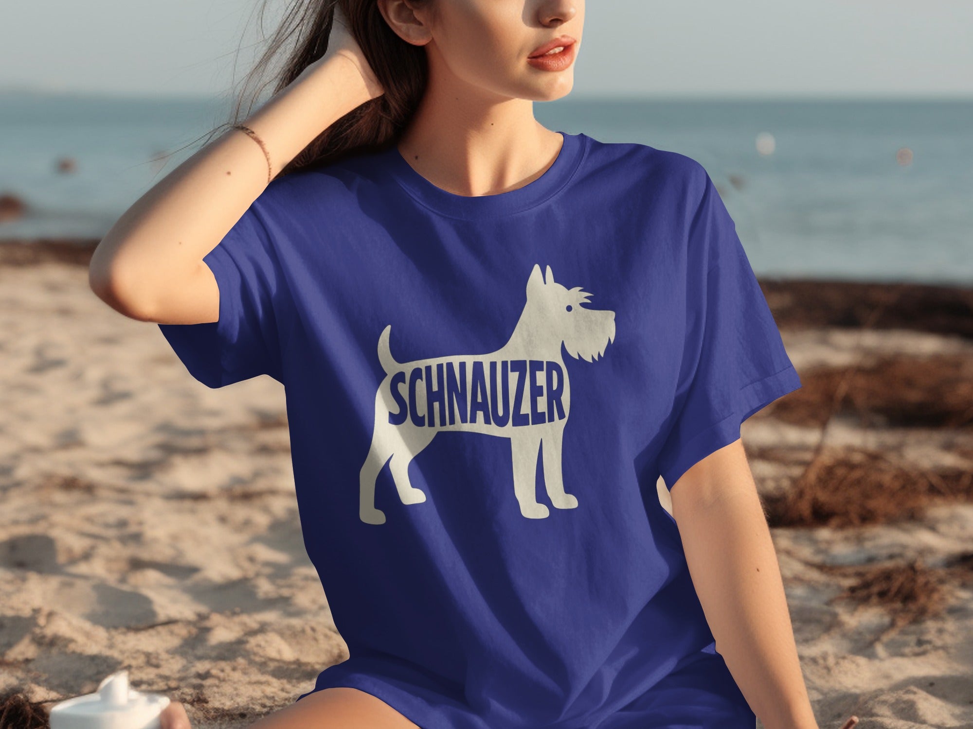 Blue t-shirt with white silhouette of a schnauzer dog and the word "SCHNAUZER."