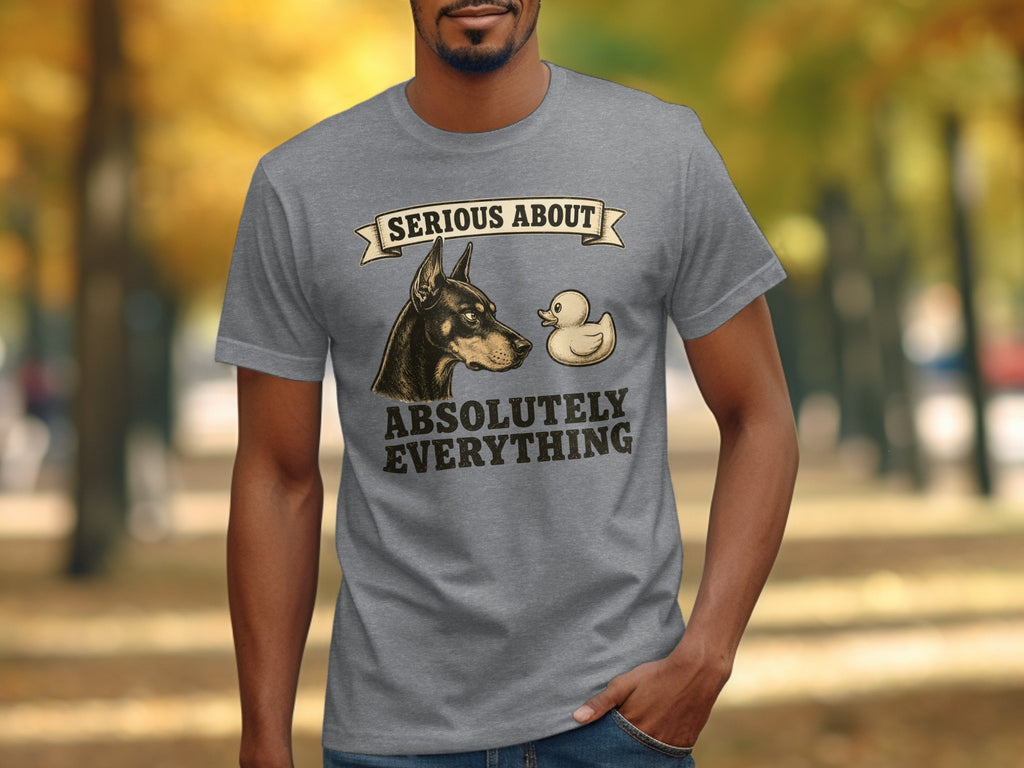 Gray t-shirt with a German Shepherd and rubber duck, reads "Serious About Absolutely Everything".