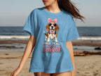 Blue t-shirt with a beagle wearing sunglasses and a pink bow.