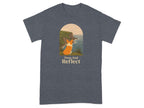 T-shirt with a corgi looking at the ocean over cliffs, text says "Paws And Reflect".