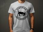 T-shirt with black circular logo of a beagle sniffing, text "Certified Sniff Inspector".