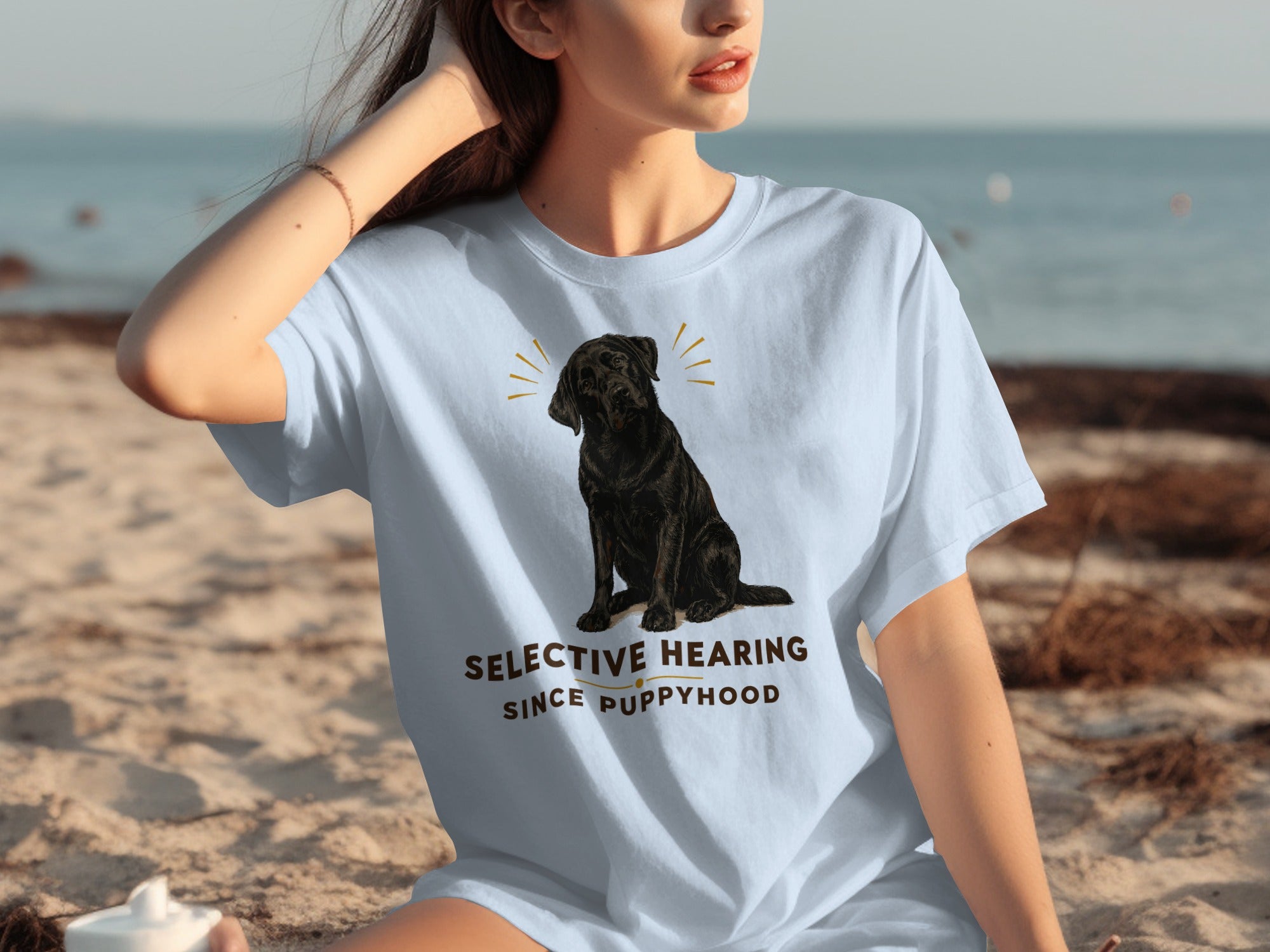 Light blue t-shirt with a black dog graphic and text "SELECTIVE HEARING SINCE PUPPYHOOD".