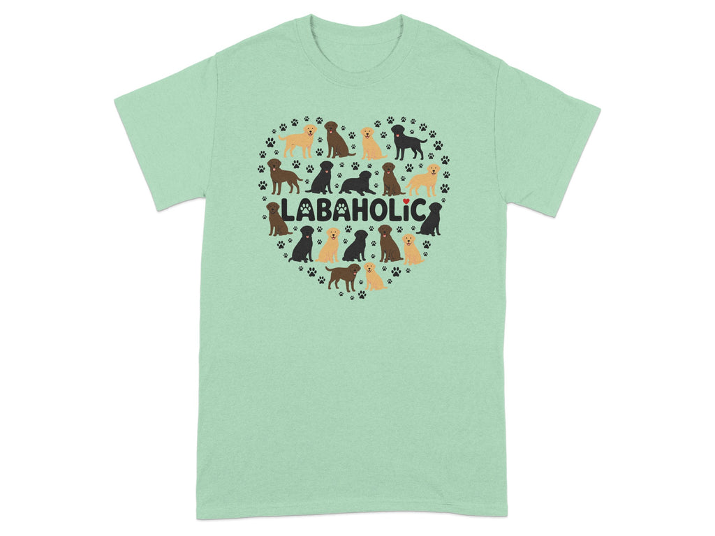 Green t-shirt with "LABAHOLIC" text surrounded by a heart of cartoon dogs and paw prints.