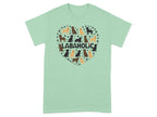Green t-shirt with "LABAHOLIC" text surrounded by a heart of cartoon dogs and paw prints.