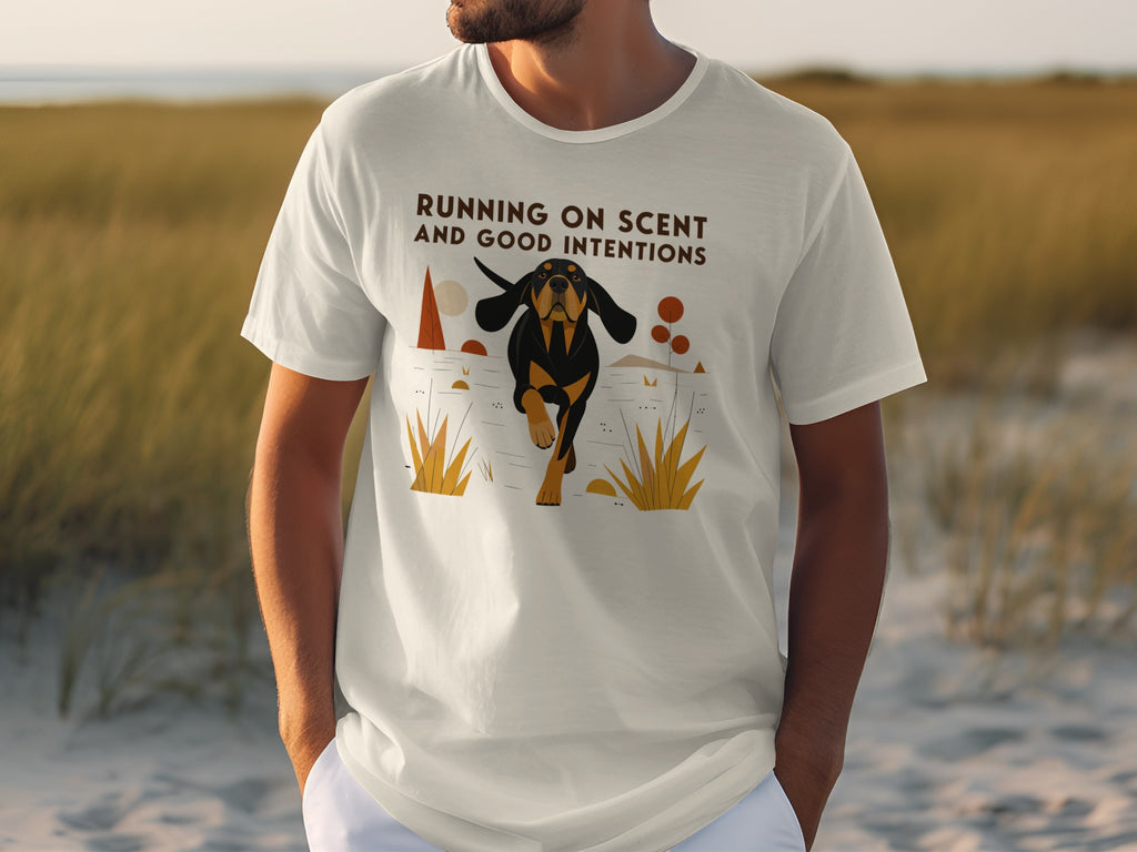 T-shirt with black and tan dog running and text "Running on Scent and Good Intentions".