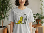 Golden Retriever vs. the Vacuum cartoon graphic on a grey t-shirt.