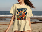 Cream t-shirt with "Let Sleeping Dogs Sleep. Do Not Disturb" and dog graphic.