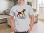 White t-shirt with abstract dog graphic and text "feral little creature, perfectly formed."