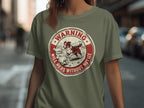 Circular logo with a dog herding sheep and text "Warning Will Herd Without Notice."