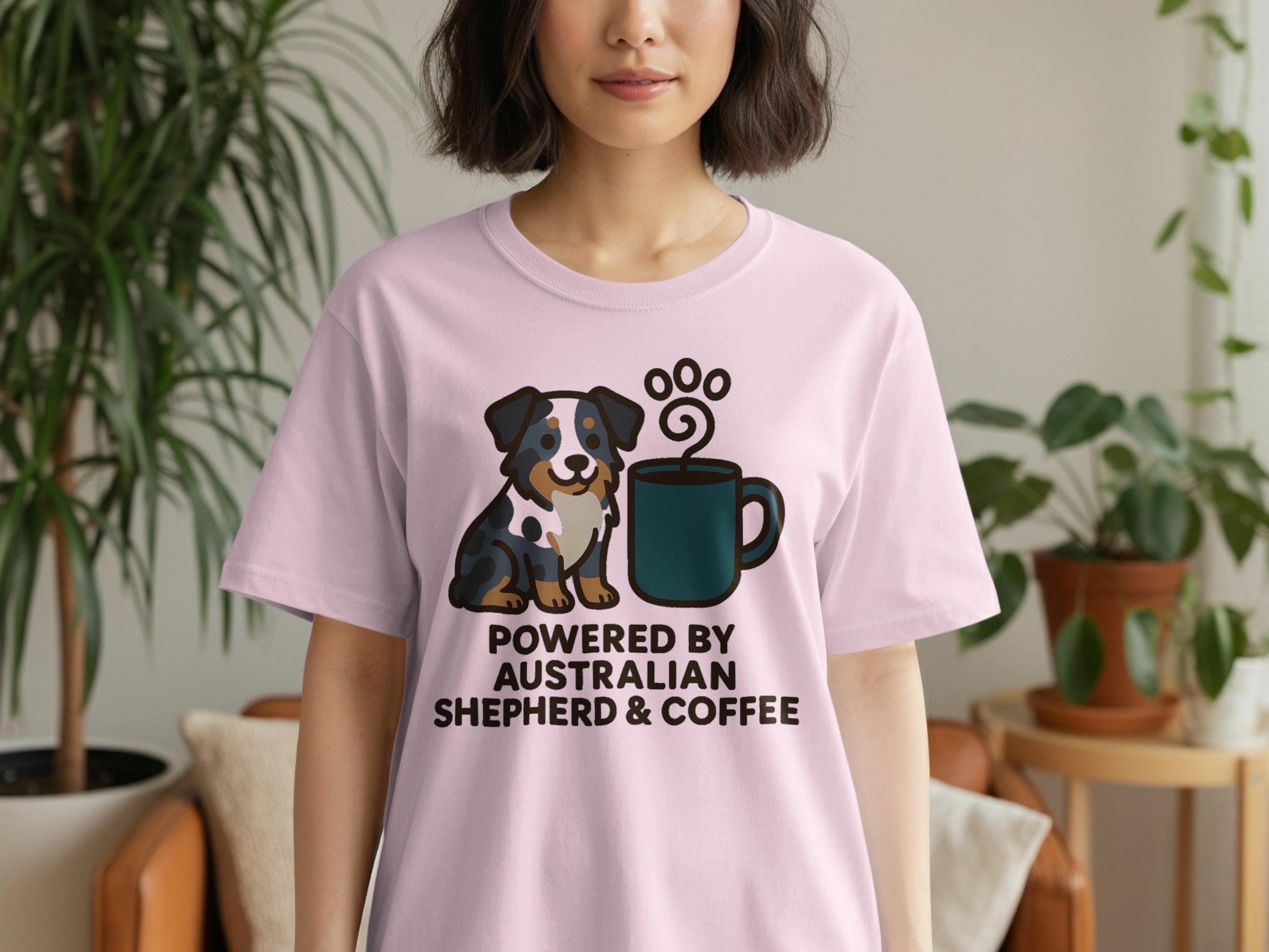 Pink t-shirt with Australian Shepherd and coffee graphic and text.