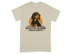 Beige t-shirt with a dog and text "SELECTIVE HEARING SINCE BIRTH".