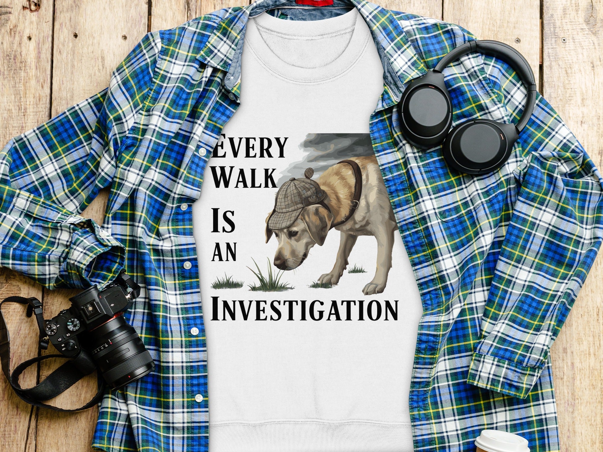 White t-shirt with "Every Walk Is An Investigation" and dog graphic.