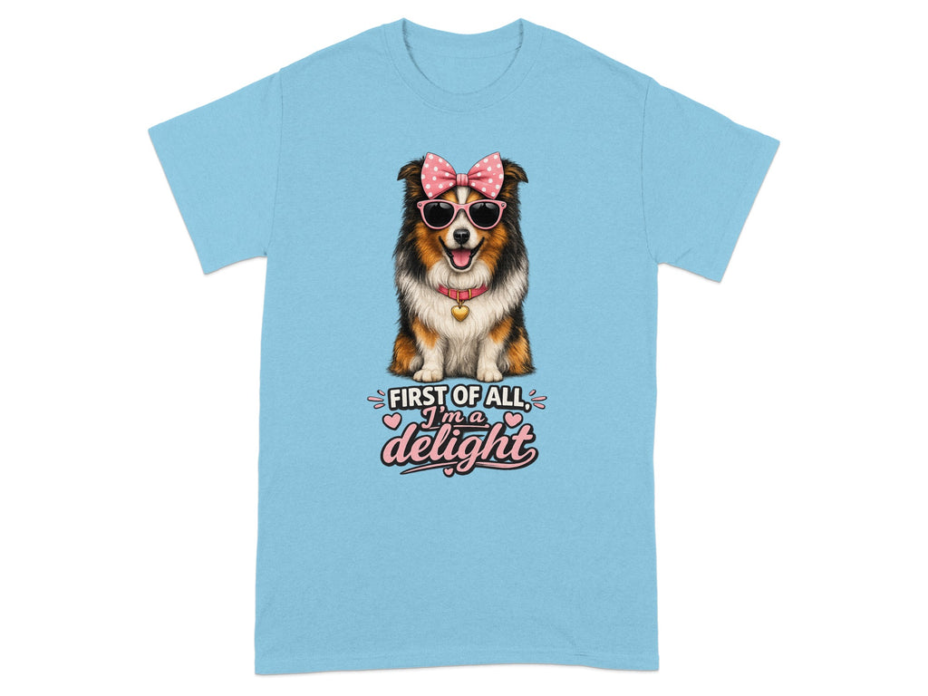 Blue t-shirt with a dog wearing pink sunglasses and bow, with "delight" text.