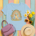 Adorable Labrador in Garden with Rainbow Graphic T-Shirt in Light Blue