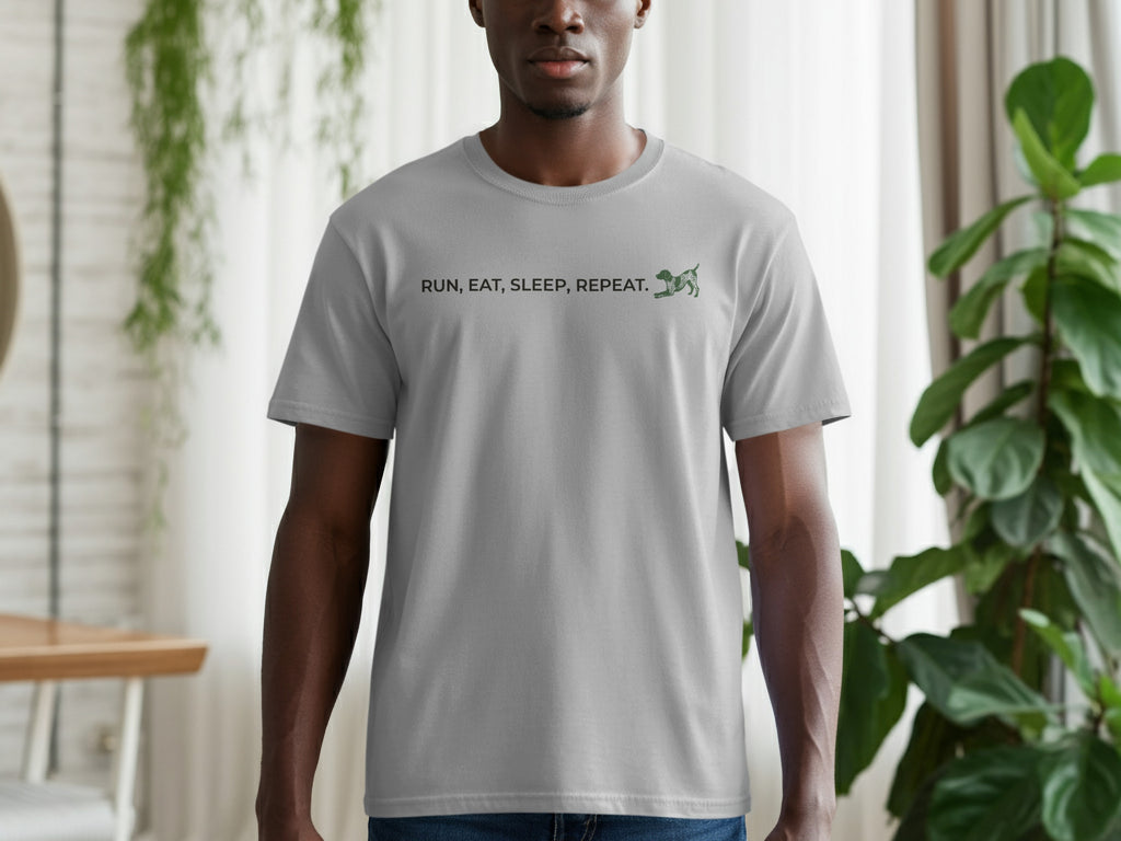 Grey t-shirt with "RUN, EAT, SLEEP, REPEAT." text and dinosaur graphic.