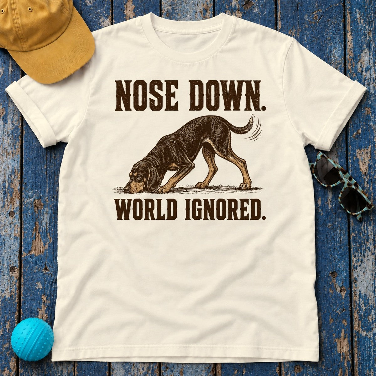 Nose Down. World Ignored. Coonhound T-shirt in Natural
