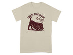 Light beige t-shirt with maroon dog illustration and text "TRUST THE NOSE".
