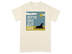 Rottweiler dog lying down, "ROTTIE DAYS ARE THE BEST DAYS" text, sun.