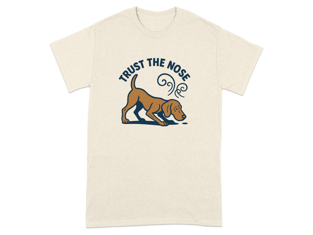 Cream t-shirt with brown dog sniffing and "TRUST THE NOSE" text.