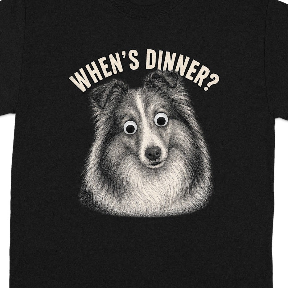 Black t-shirt with a drawing of a dog and text reading "When's Dinner?".