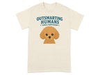 Cream t-shirt with a cartoon poodle and text "OUTSMARTING HUMANS SINCE PUPPYHOOD".