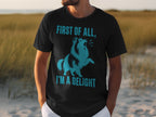 Black t-shirt with blue text "FIRST OF ALL, I'M A DELIGHT" and a dog graphic.