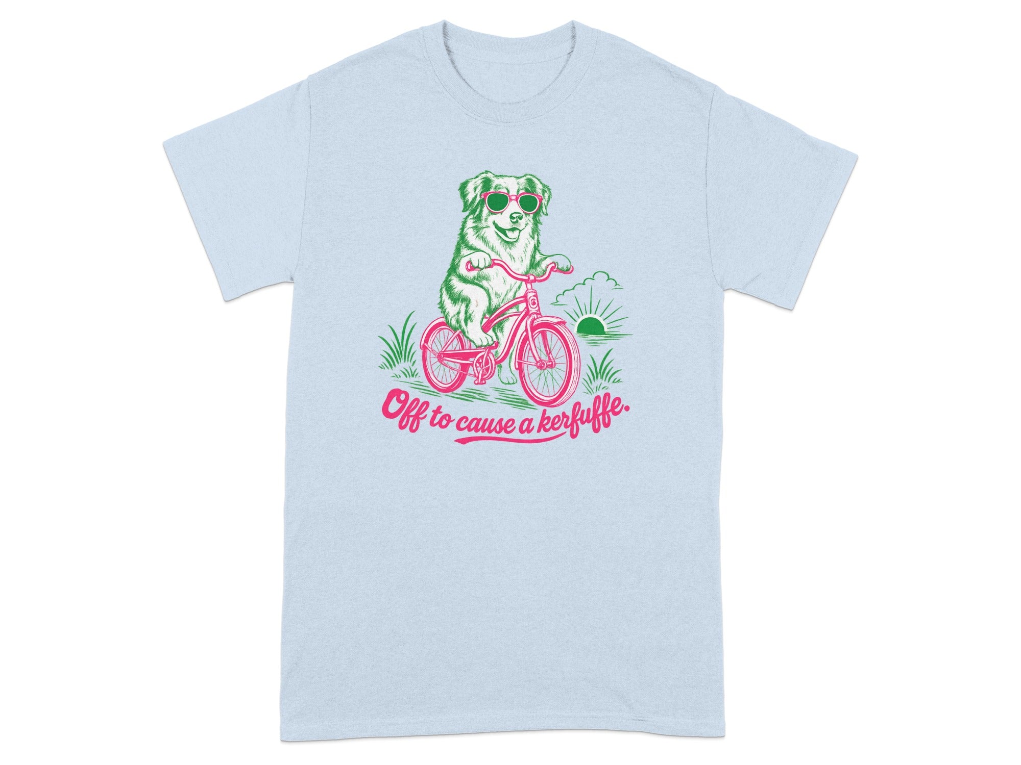 Light blue t-shirt with a dog in sunglasses riding a bicycle, text reads "Off to cause a kerfuffle."