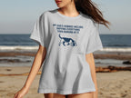 Gray t-shirt with a blue dog graphic and text "MY DOG'S HOBBIES INCLUDE: SNIFFING EVERYTHING THEN BARKING AT IT."