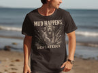 Black t-shirt with white text "MUD HAPPENS REPEATEDLY" and a splashing dog graphic.