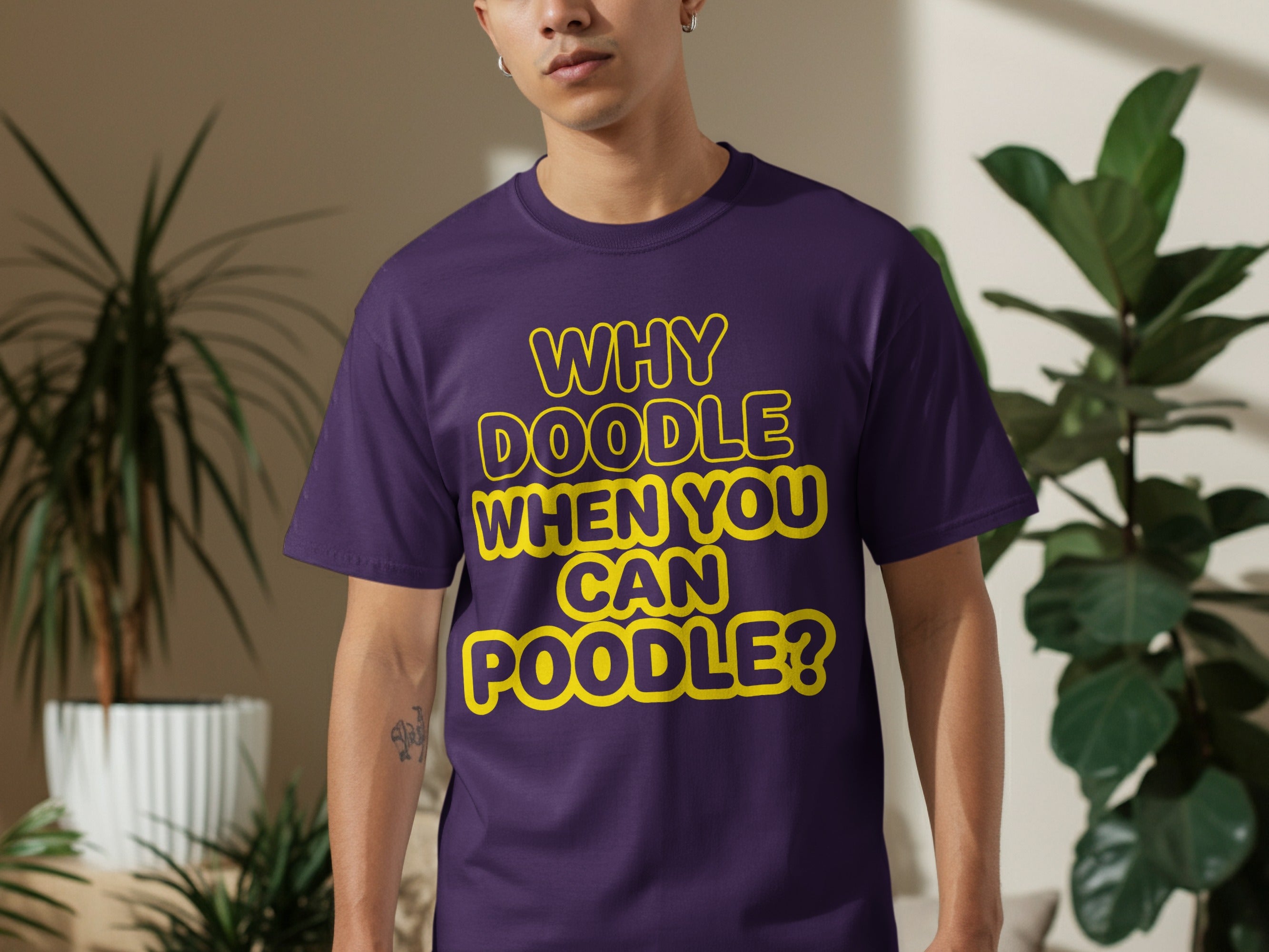 Purple t-shirt with "Why Doodle When You Can Poodle?" text.