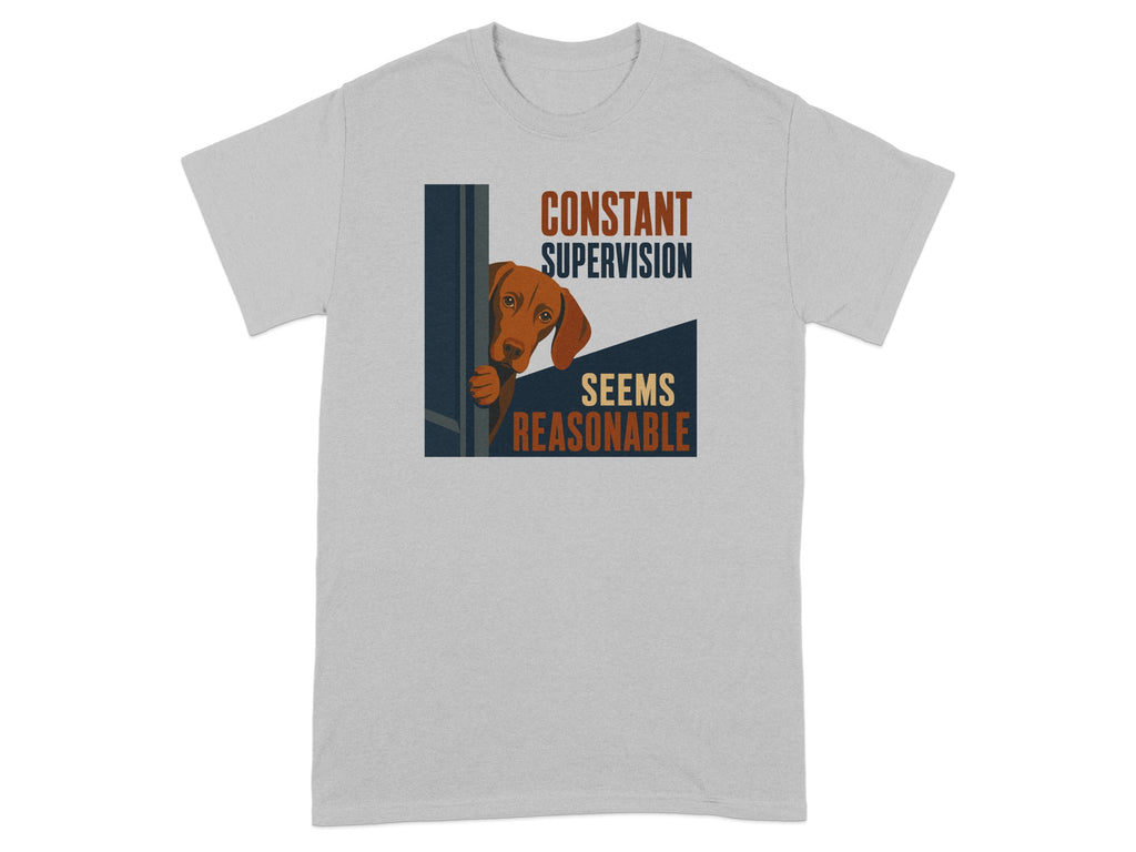 Grey t-shirt with a dog peeking around a corner and text.