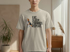 Beige t-shirt with "Eat. Sleep. Zoomies. Repeat." and a beagle illustration.