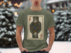 T-shirt featuring Queen of Hearts playing card with a dog wearing a crown.